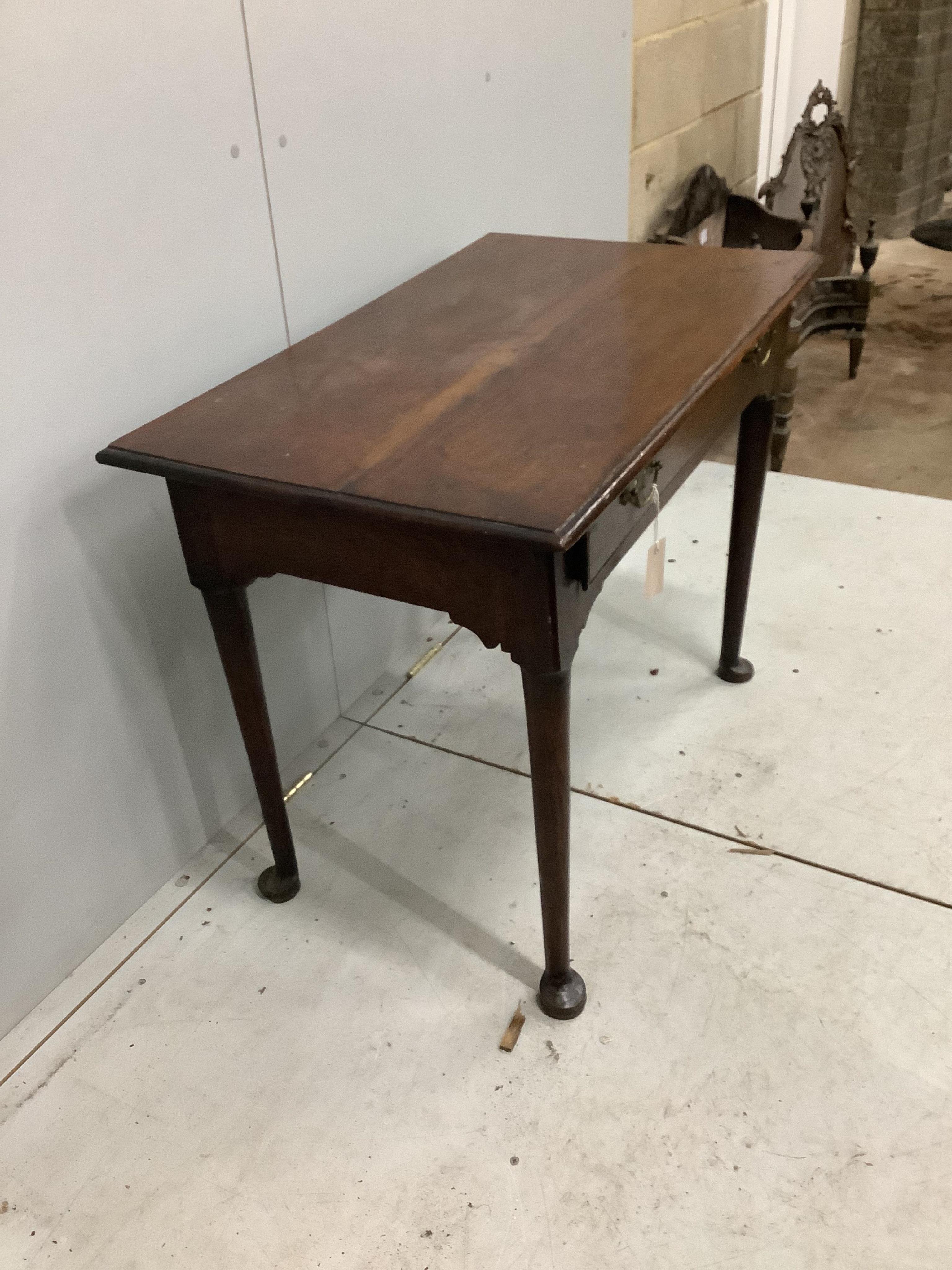 A George III oak side table fitted drawer on pole turned legs with pad feet, width 90cm, depth 54cm, height 69cm. Condition - fair